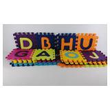 Twenty-six foam interlocking puzzle pieces,