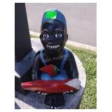 Black Memorabilia Painted Concrete Figure, Note