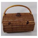 Picnic basket with utensils, plates, wine