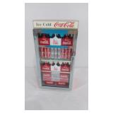 Coca-Cola coin bank, battery operated to play