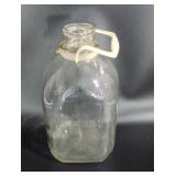 Glass, one gallon milk bottle