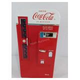 Coca-Cola Bank,  metal, plays Coke jingle when