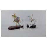 Three porcelain figurines, the carousel horse is
