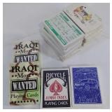 Twelve packs of unopened playing cards, 2 Iraqi