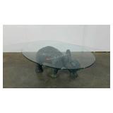 Glass topped coffee table, top measures 32 x 45,