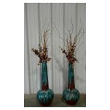 Two tall ceramic home decor vases with dried