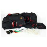 Three duffel bags, golf tees, beach ball and ball