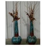 Two tall ceramic home decor vases with dried