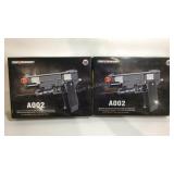 Two new air soft BB guns