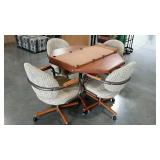 42" octagonal table with 18" leaf and 4 chairs on