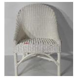 Child sized white wicker chair, has some glitter
