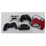 Group of 5 video game controllers