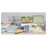 Storage tote with new home decor, placemats,