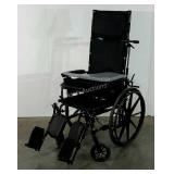 Invacare wheelchair, includes leg rests and tray