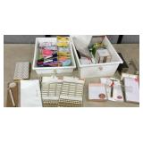 Two organizers with pens, staplers, post it