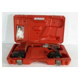Milwaukee cordless drill with two batteries and