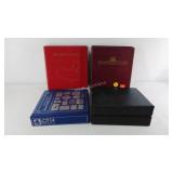 Five unused stamp collecting albums