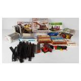 Train cars and accessories, includes lots of