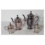 Tea set, includes two tea pots, creamer and