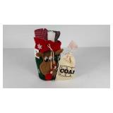 Holiday gifts, tea towels in gift bag and bag of