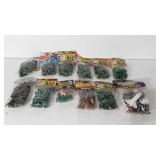 Twelve bags of toys, unopened, includes Combat