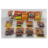 Carded Matchbox cars with tape and writing on