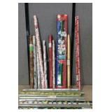 Wrapping paper, 22 rolls mostly Christmas designs