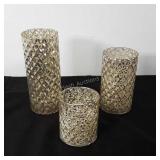 Flamless candles, sizes range from largest at 8