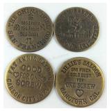 Four brass brothel tokens