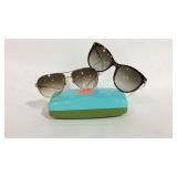 Two pairs of sunglasses with tags, Kate Spade and