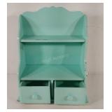 Hangable wooden shelf with drawers, does have