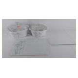 Two covered casserole dishes and two glass