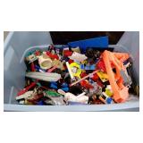 Toy group, legos, cars, dinosaur, etc.