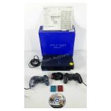 Playstation 2, 2 remotes, 2 memory cards 8mb, 1
