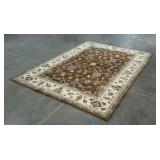Area rug, 68" x 95", browns and blues, edge wear