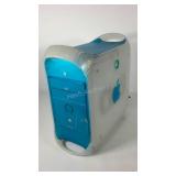 Apple computer tower, powers on, blue and clear