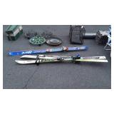 Two Sets of Snow Skies, one set of poles