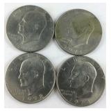 Four Kennedy dollars, 1971, 1972(2), and