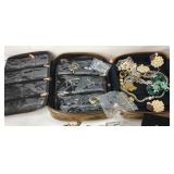 Jewelry travel organizer with some jewelry and a