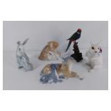 Group of animal figurines and decorative bell, 4