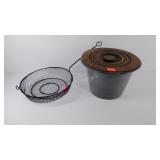 Wire cooking basket and enameled pot with wood