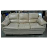 Leather look sofa,  78" wide, needs wiped down