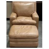 Bassett leather arm chair and ottoman, a few