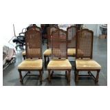 Six caned back dining chairs, seller code WP, one