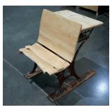 School house style desk, seat in front is broken