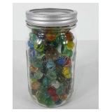 Ball wide mouth Mason jar full of marbles