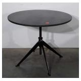 Heavy weight marble style round top table, has