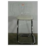 Acrylic chair with tubular aluminum base, foot