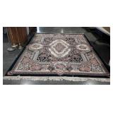 Floral area rug with fringed edges, 105" × 138"