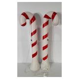 Christmas decor, candy cane yard lights, both